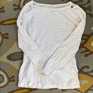 Long sleeve white tee with gold shoulder buttons